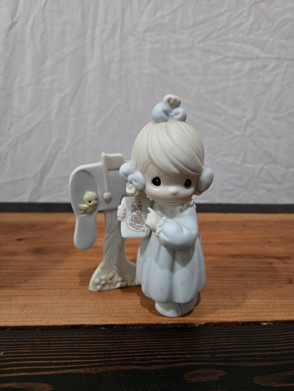 Precious Moments Cream and White Girl Figurine with Mailbox